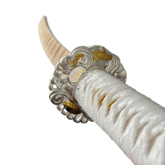 Non-sharpened wooden katana blade with flame-effect fabric wrap close-up
